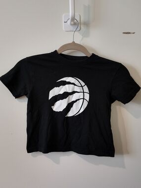 NBA Raptors Black Crop Tee with White Claw Basketball Logo
